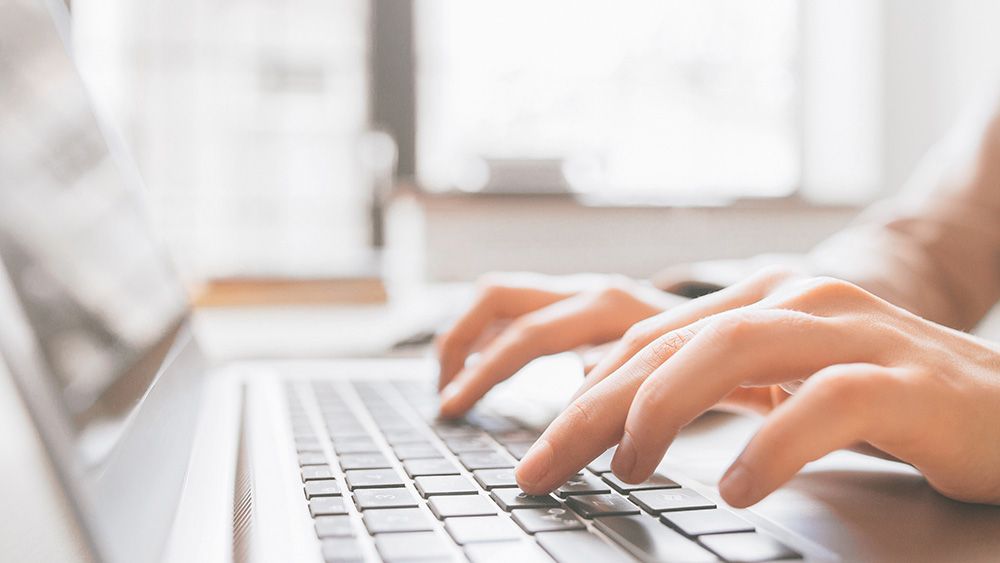 Libraries_Fingers on Laptop_optimized.jpg